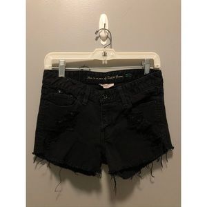 Levi Women’s Distressed Black Stretch Denim Shorts